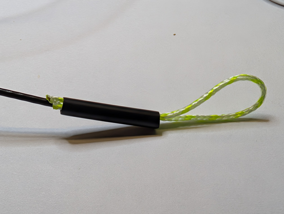 Heat shrink slid down over wire and almost to the ends of the doubled line