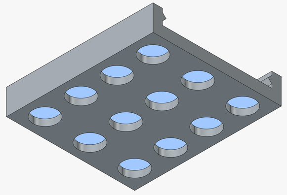 Screen shot of FreeCAD model of morse code key base as described in text. It has twelve holes for installing magnets in. Each hole is highlighted in light blue.